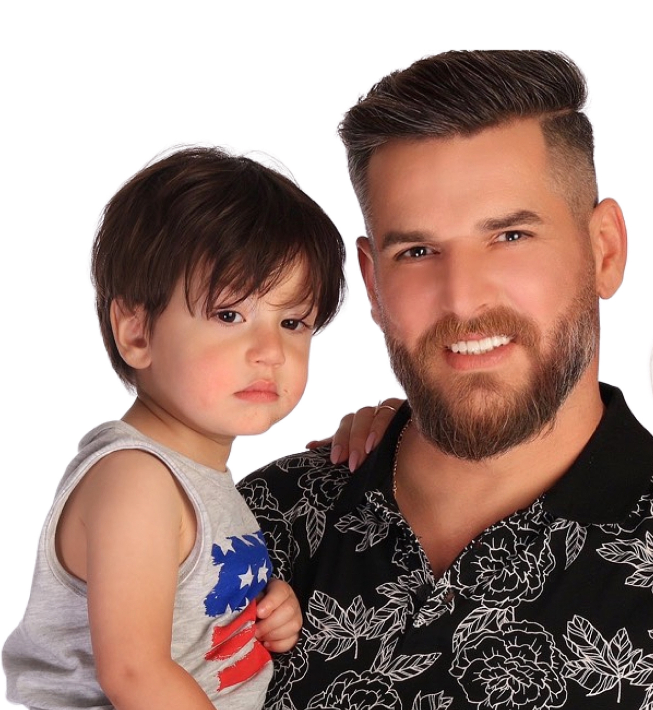 David Almoshe owner of Barber Vegas in Las Vegas with his child
