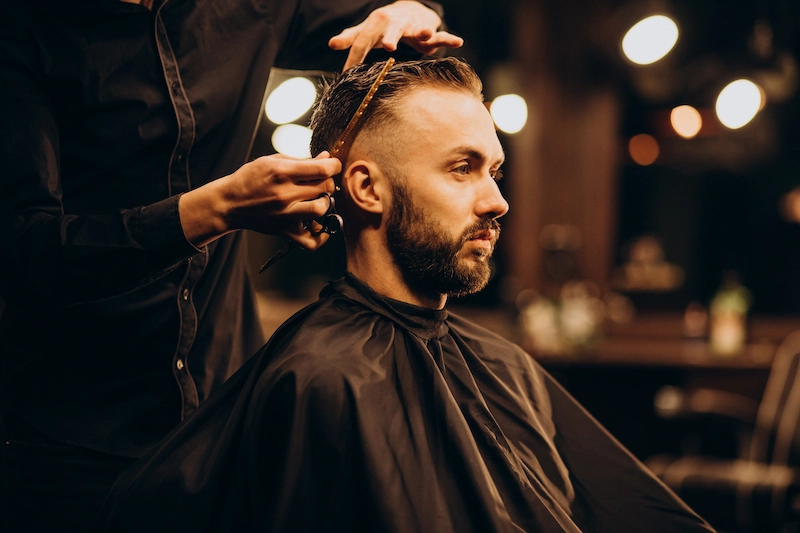 young-man-barbershop-trimming-hair - BarberVegas | Las Vegas Barber – D sharpcut & ICONIC BARBERSHOP